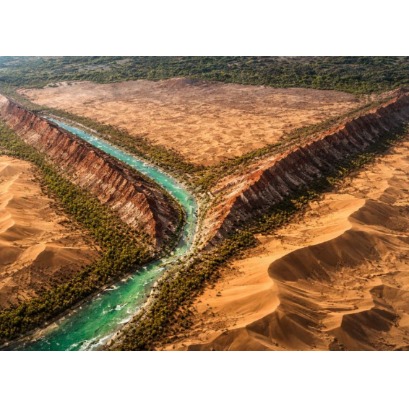 Seen from space, a colossal Y cuts through Chinas largest desert, blending a jade-filled river with red and white mountains and revealing the absurd scale of the Taklamakans transformation surrounded by a green wall of billions of trees.